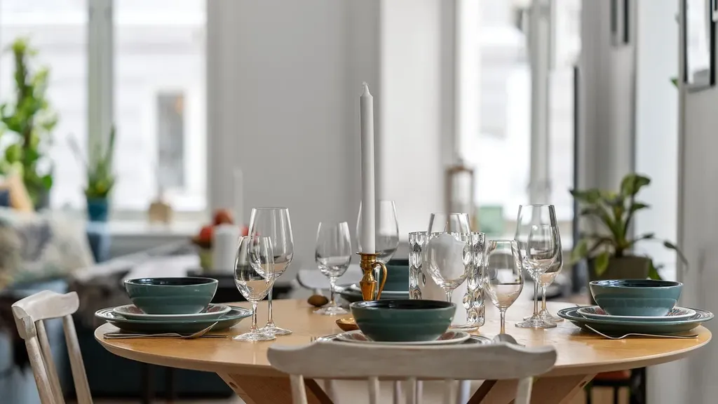 brown wooden round table with chairs